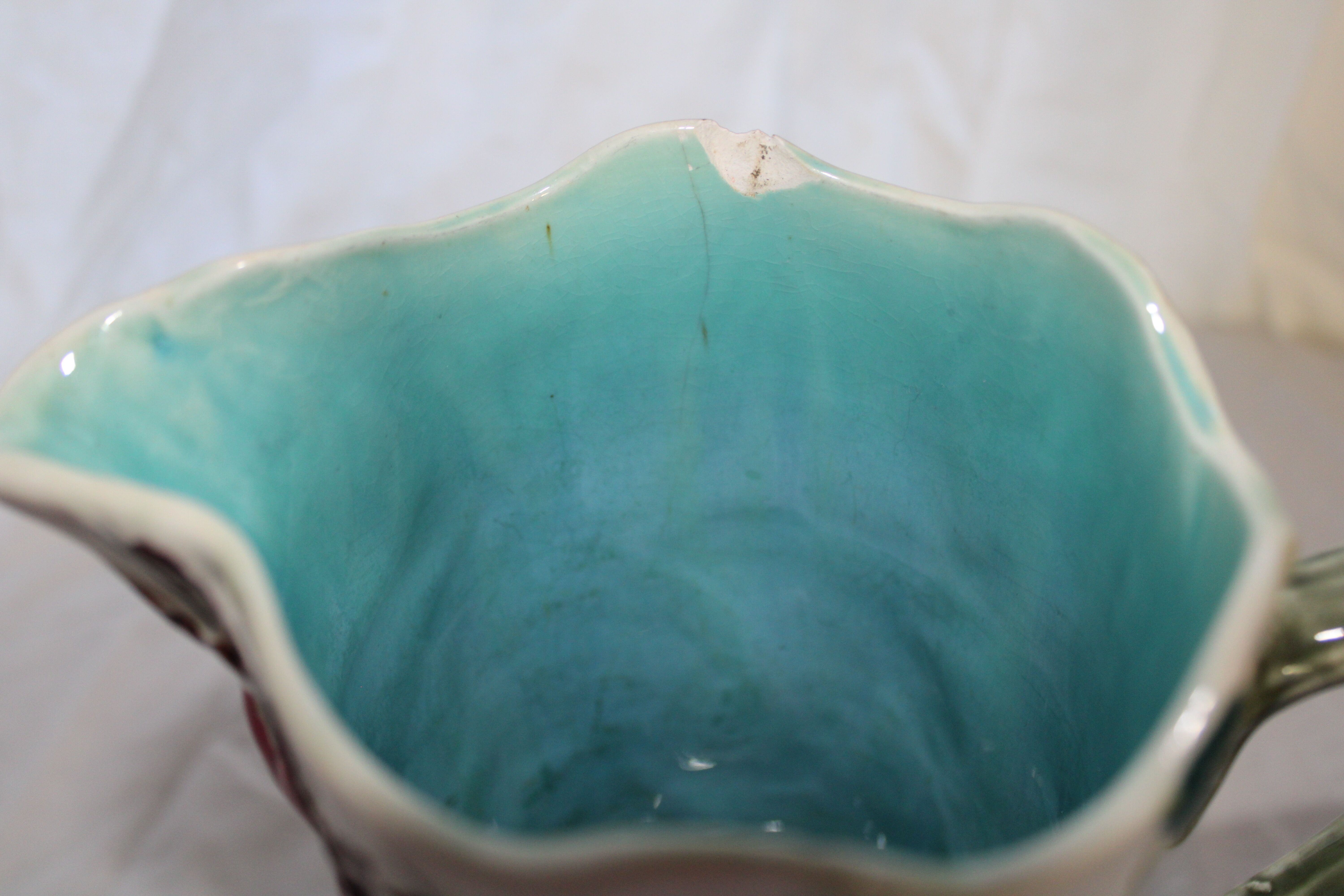 Ancient pitcher in earthenware decoration cherry Saint Amand waters
