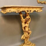 Marble top console and its rocaille style mirror