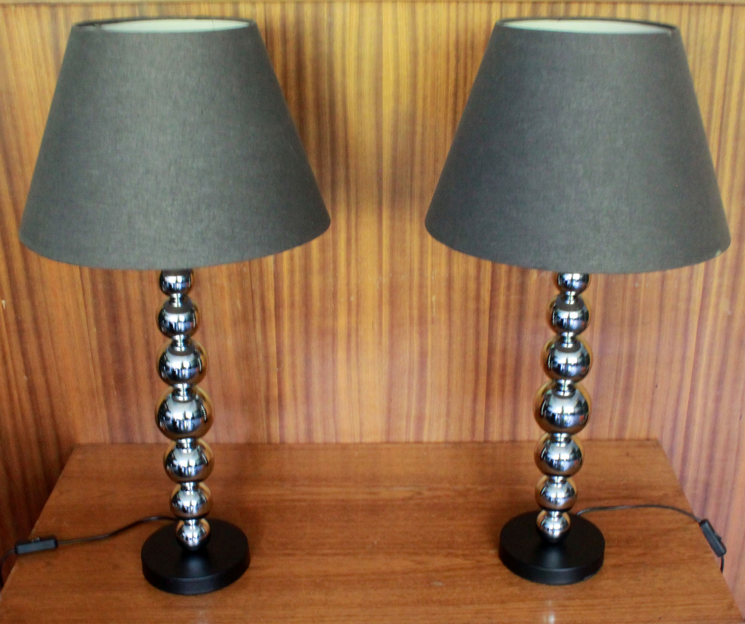 Pair of contemporary lamps with chrome base and 20th-century shade.