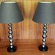 Pair of contemporary lamps with chrome base and 20th-century shade.