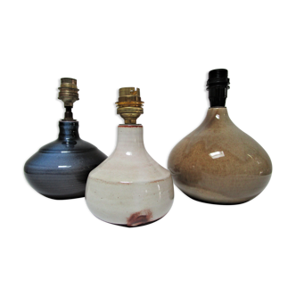 Three vintage ceramic lamps in blue, white and suede