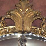 Miroir ovale en bois doré