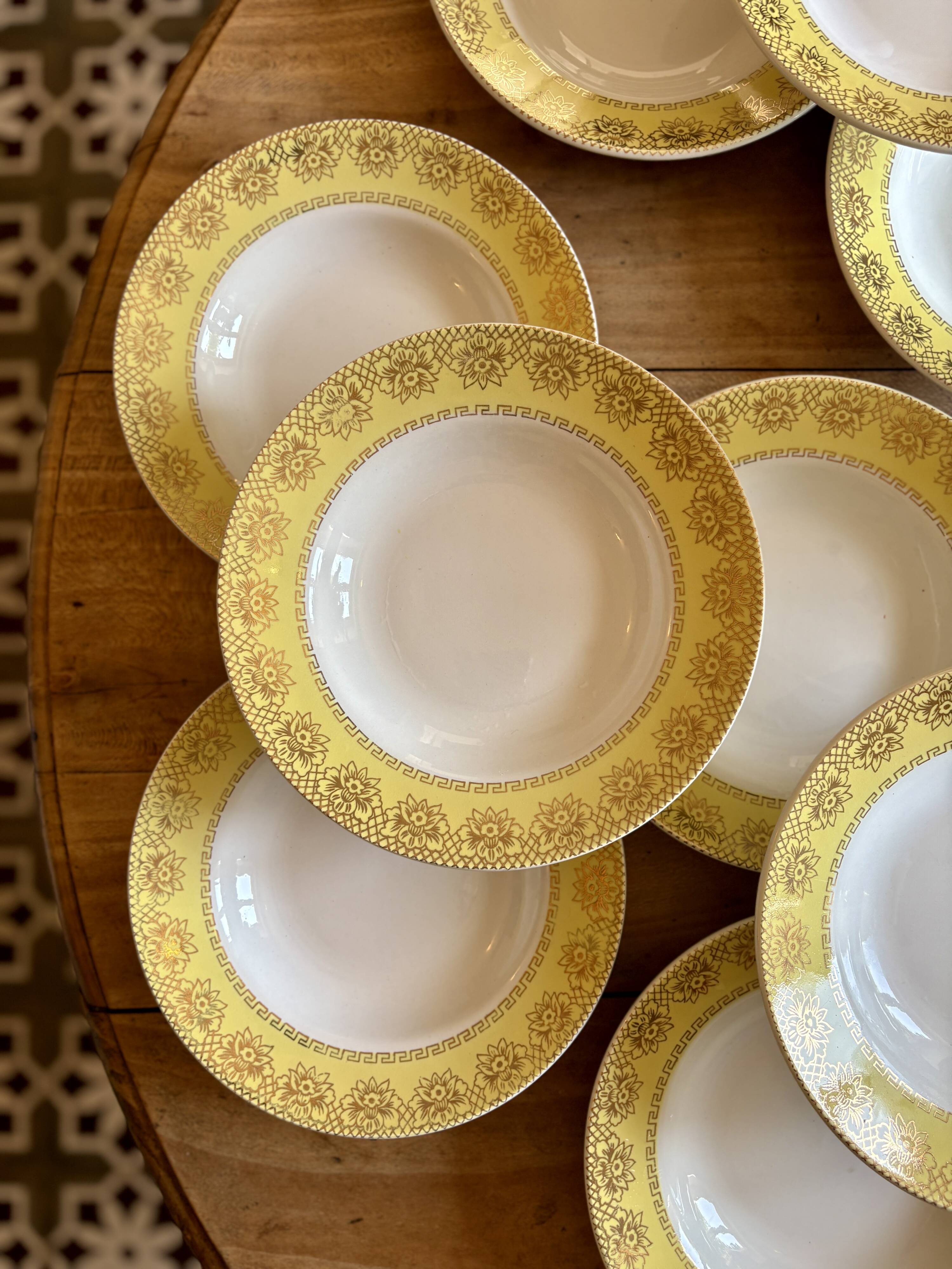 Set of 12 vintage yellow, white and gold soup plates