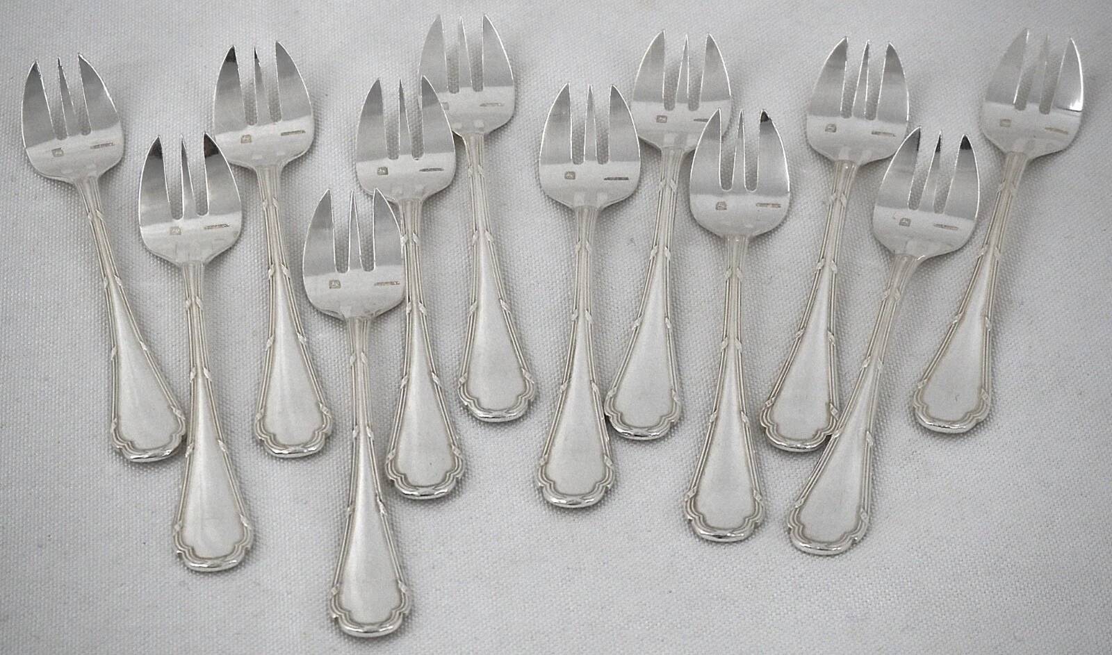 Ercuis Trianon, Rubans, 12 silver-plated oyster forks, excellent condition.