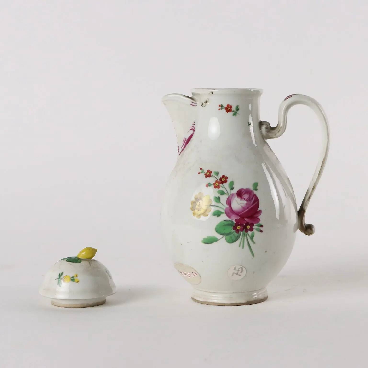 Antique white porcelain coffee pot from Vienna, painted, 18th century.