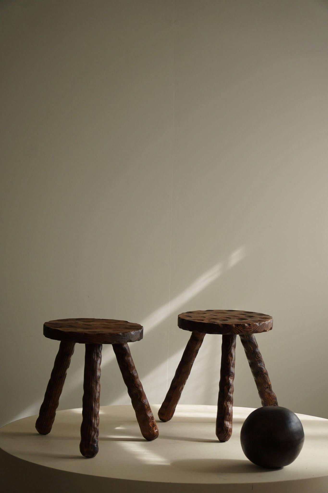 A pair of Wabi Sabi stools carved from pine, mid-century modern Swedish style, 1960s.