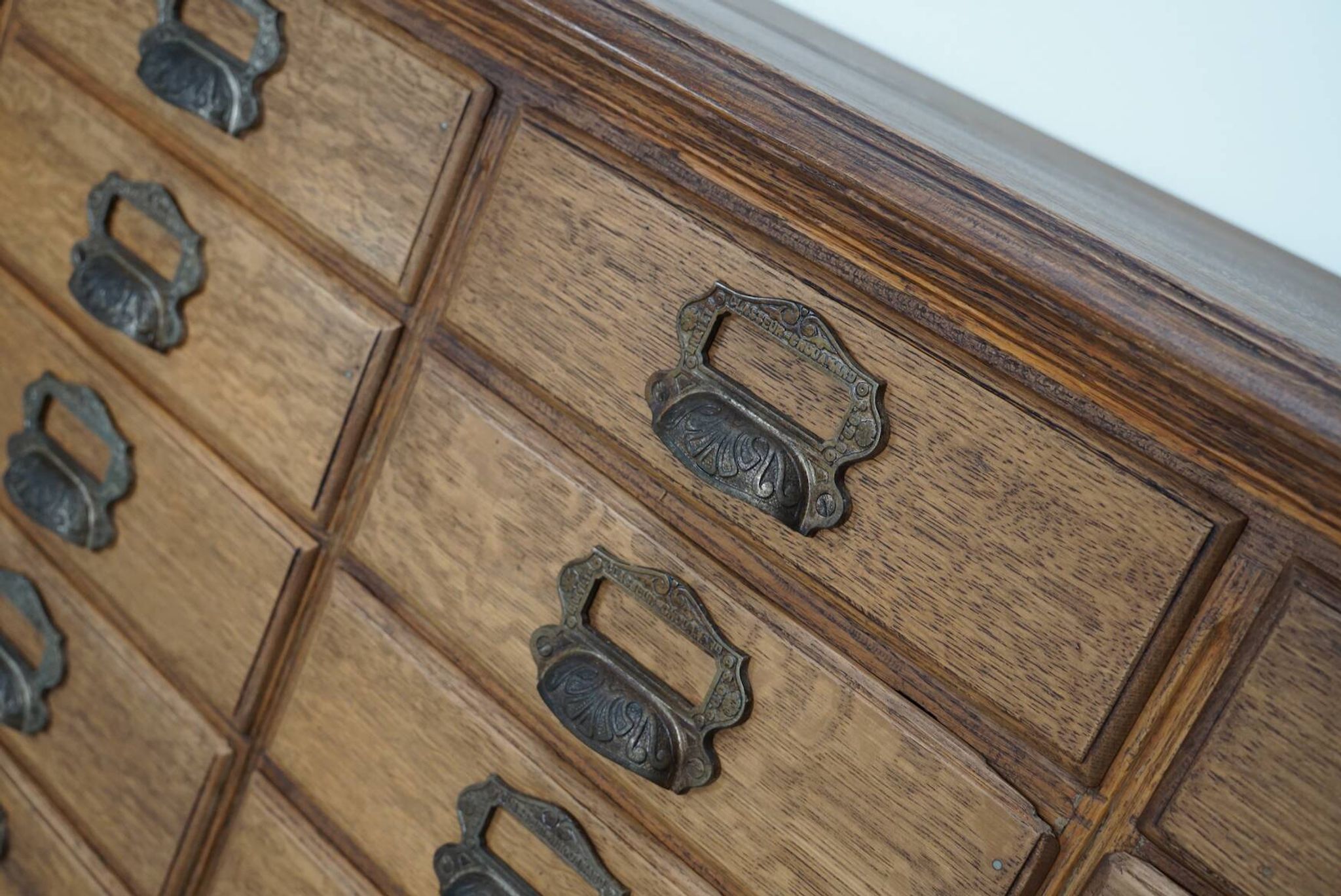 Antique French oak filing / apothecary cabinet by Chouanard, ca 1910