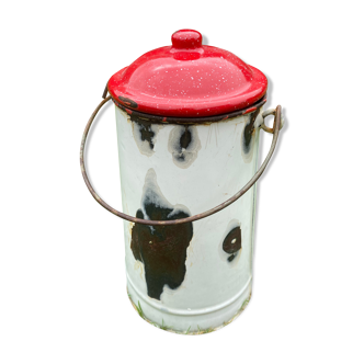 Old milk pot in enamelled sheet metal