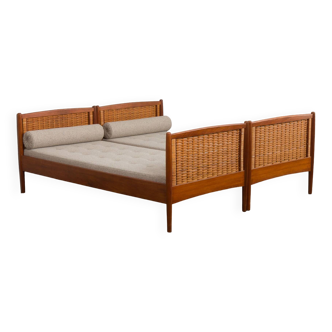 Pair of mid-century Teak and Cane beds  attr. to Kai Winding, Denmark, 1950s