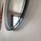 Round bluish plexiglass mirror
