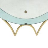 Two-tone glass and gilded brass console mirror. Circa 1950.