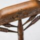 Mid Century Antiques spindle wood chaise with a rush seat.