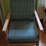 Relaxing armchair with integrated ottoman