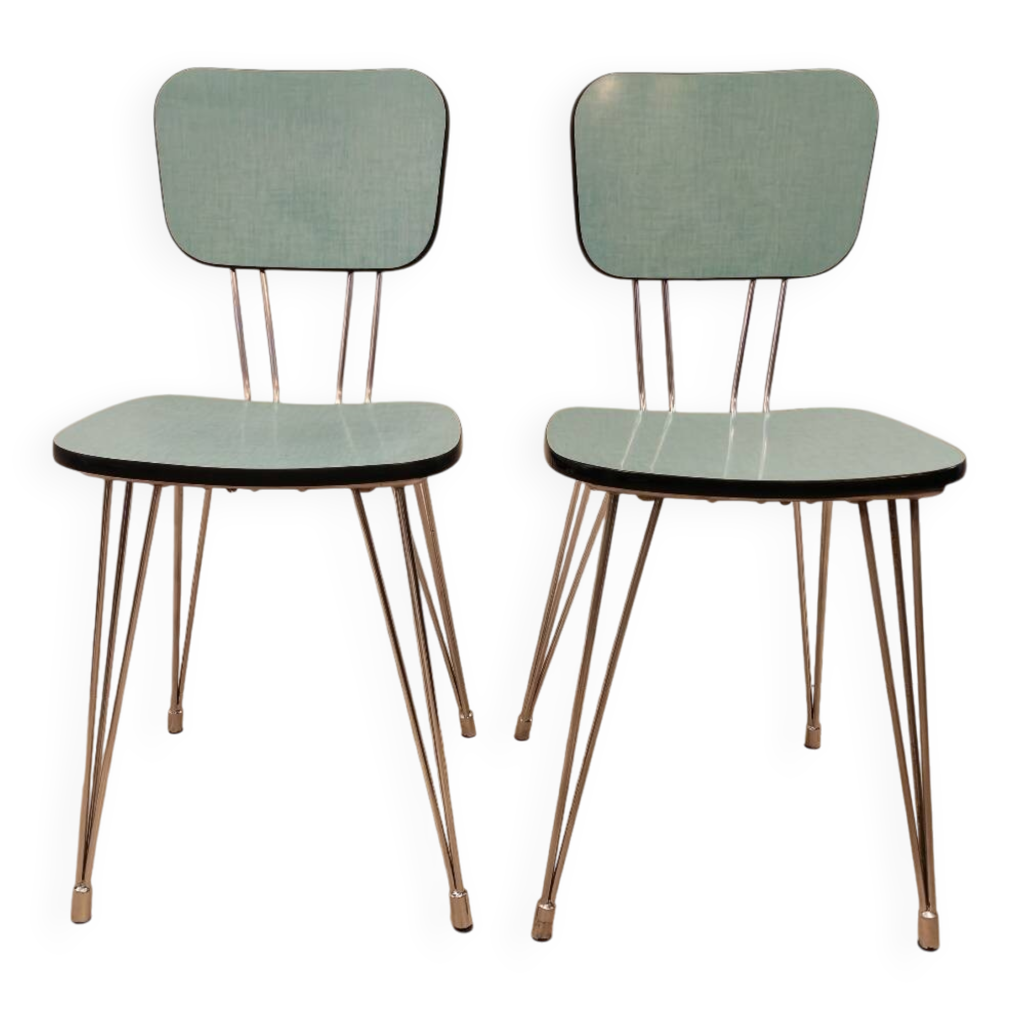 Pair of green Formica chairs with Eiffel legs