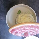 Glazed ceramic dessert plate with strawberry design.