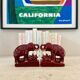 Pair of burgundy ceramic “Elephants” bookends