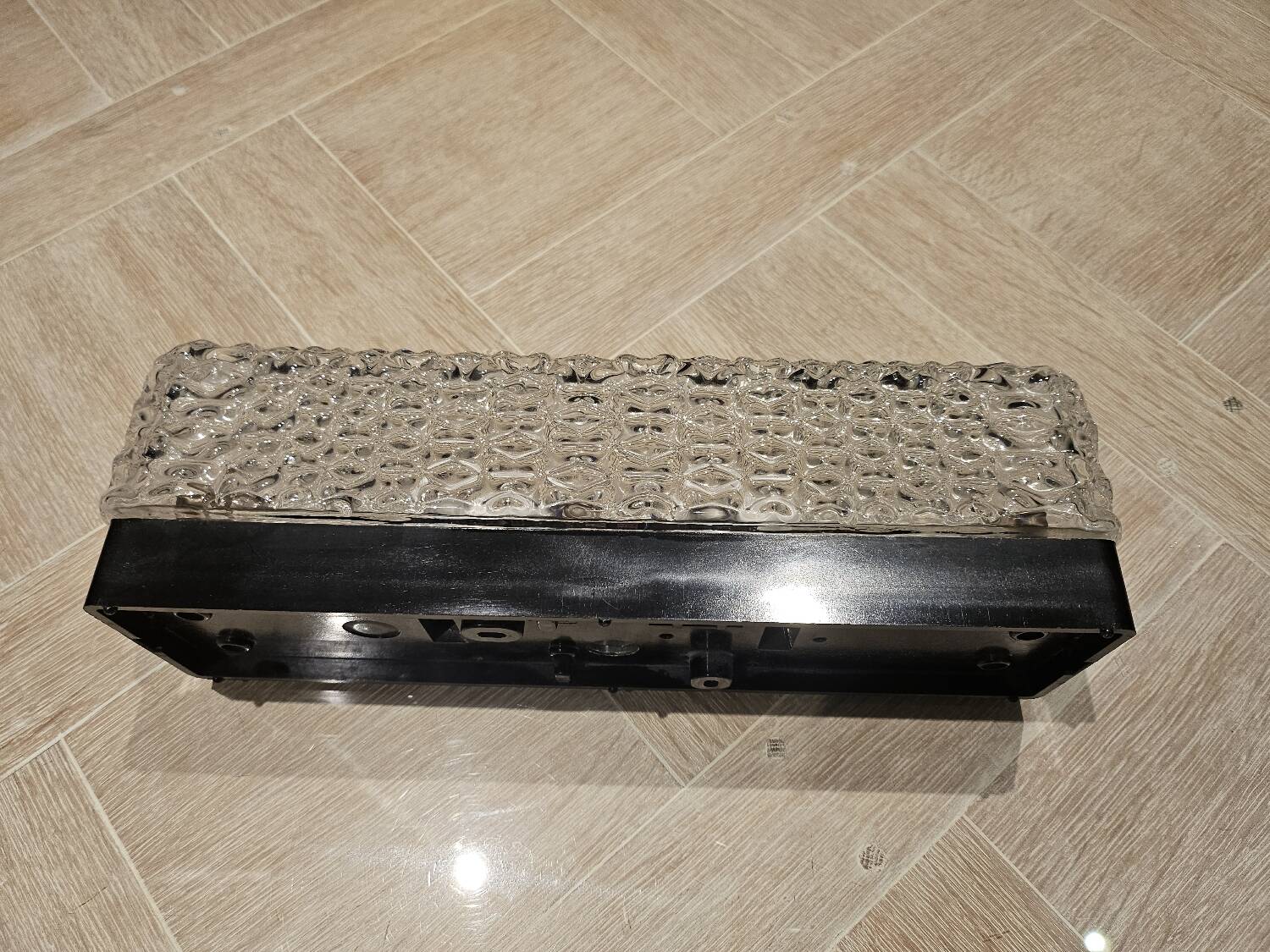 Hammered glass wall light