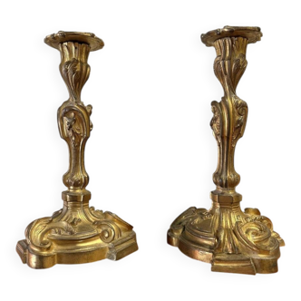 Pair of bronze candlesticks from the early 20th century in Louis XV style.