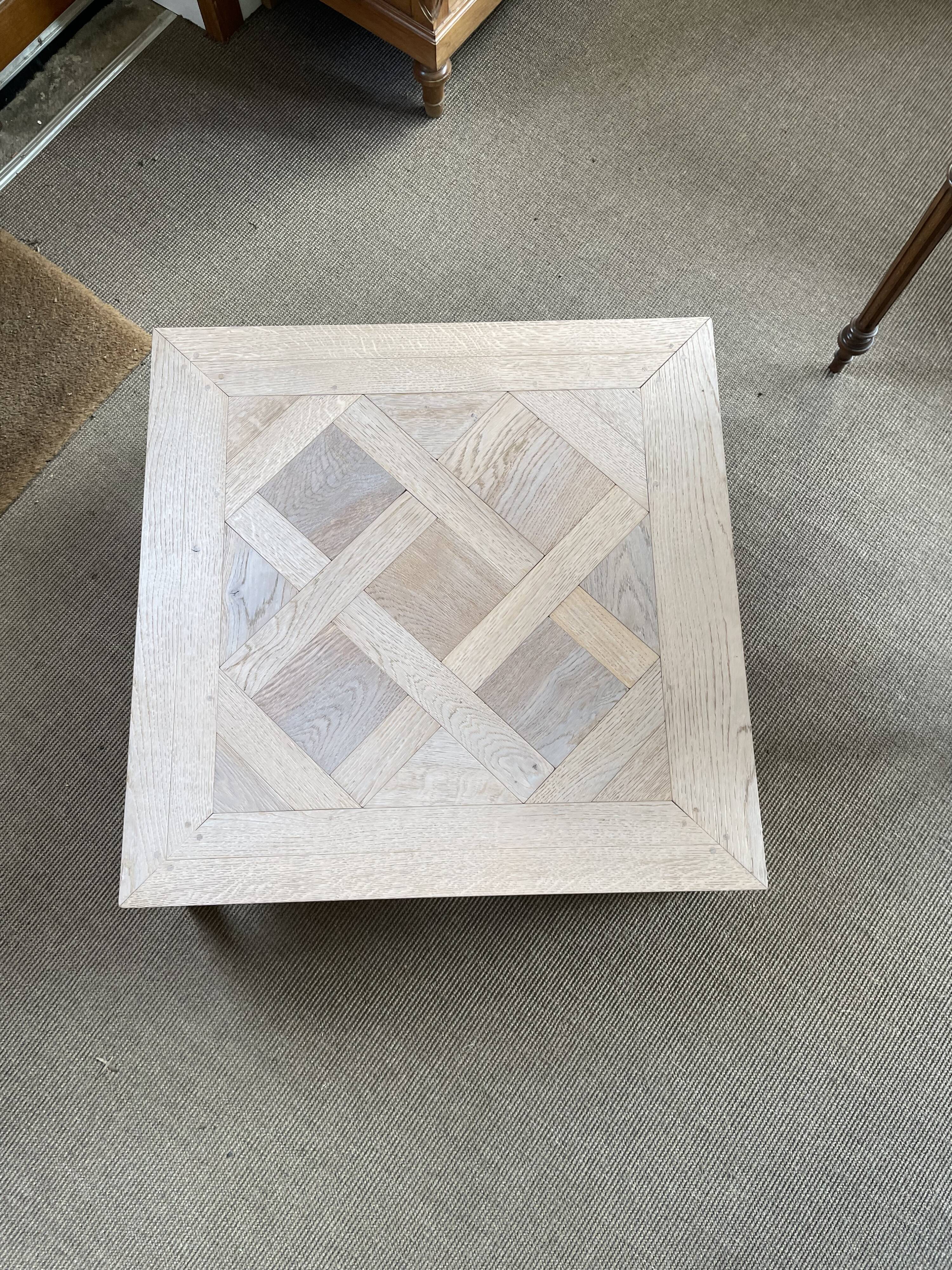 Square coffee table – Oak parquet Versailles pattern – Stainless steel base
