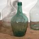 Antique colored demijohns (c.1920). Set of 3 pieces