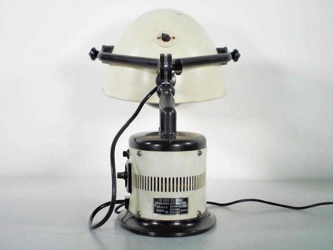 Black and white table lamp made from a 1940s solar lamp.