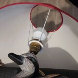 Decorative table lamp with a sculpted duck-shaped base and painted finish.