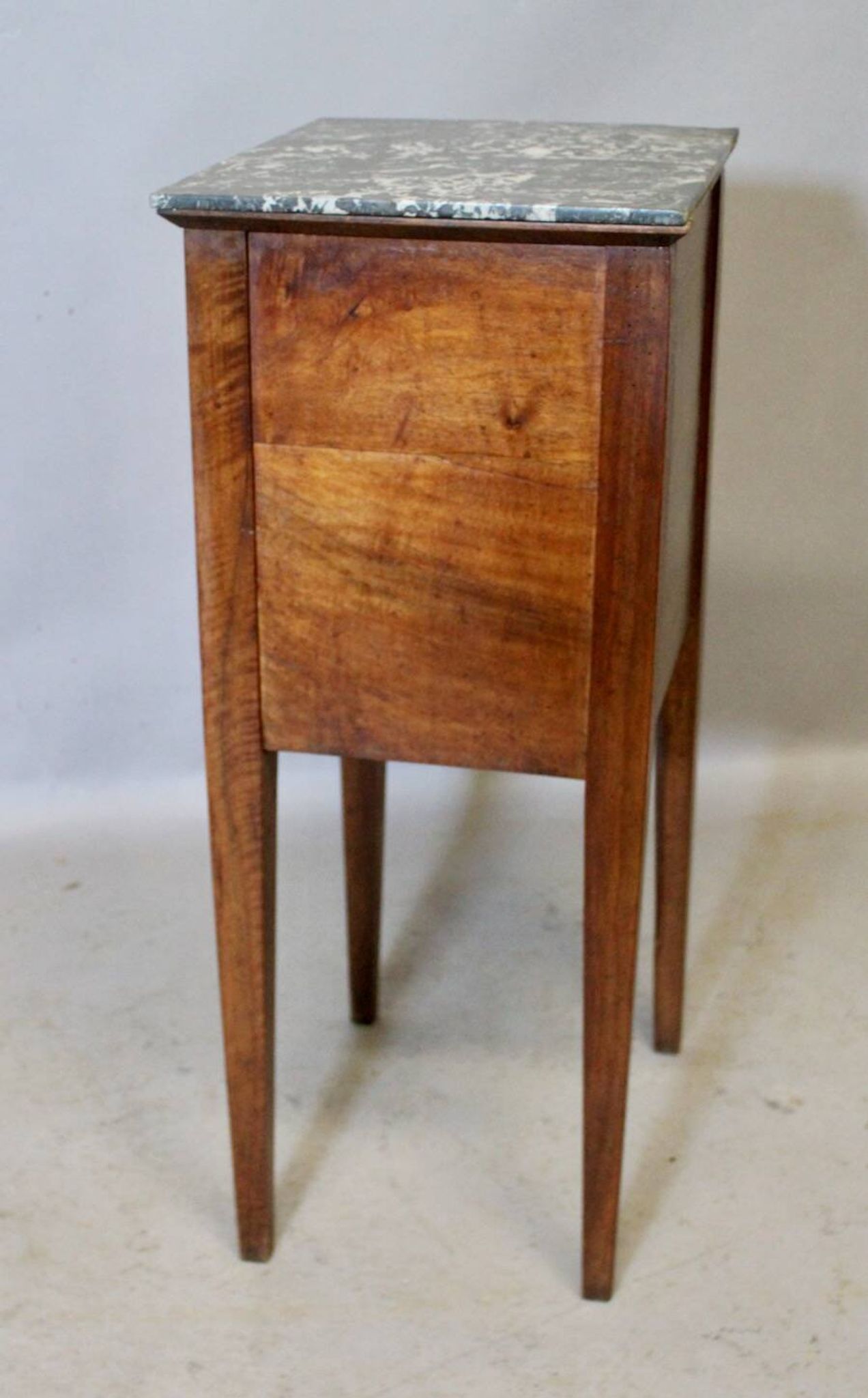 Directoire bedside table in walnut with marble top.