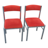 Pair of designer chairs in chrome metal and orange velvet from the 1970s.