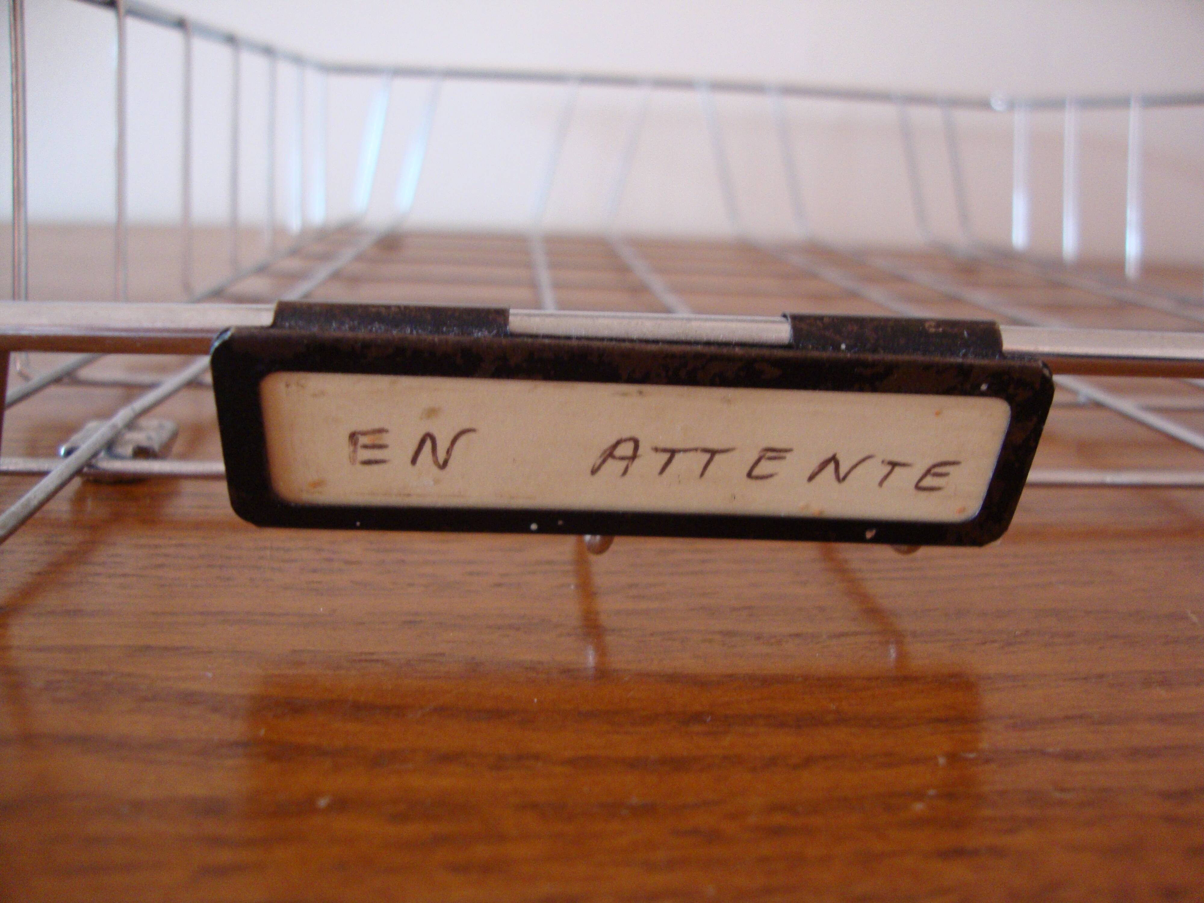 Old stainless steel mail basket from the 1970s