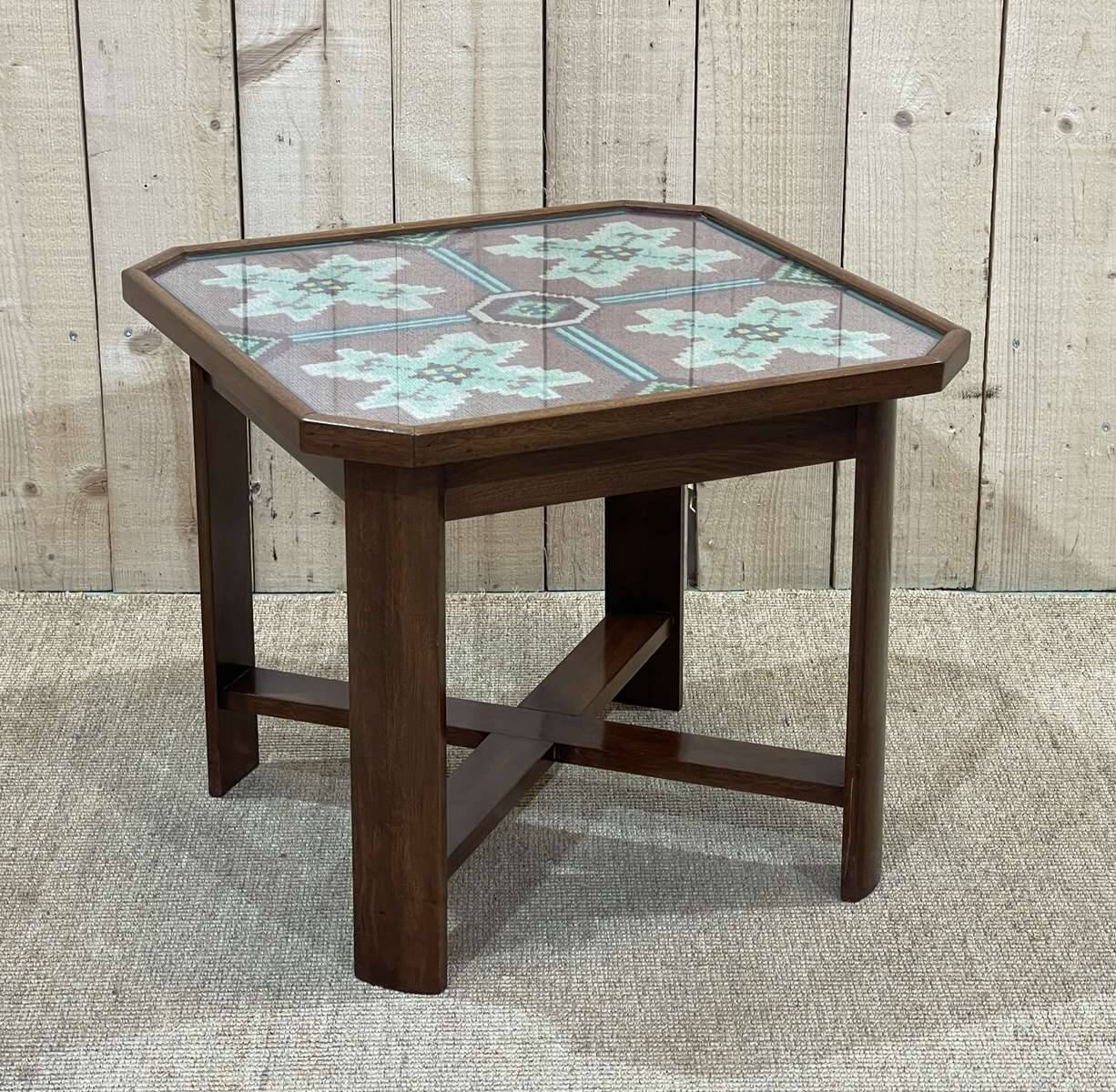 Art Deco side table in mahogany, fabric and glass.