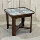 Art Deco side table in mahogany, fabric and glass.
