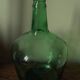 Dame Jeanne carboy from the Viresa collection in dark green glass