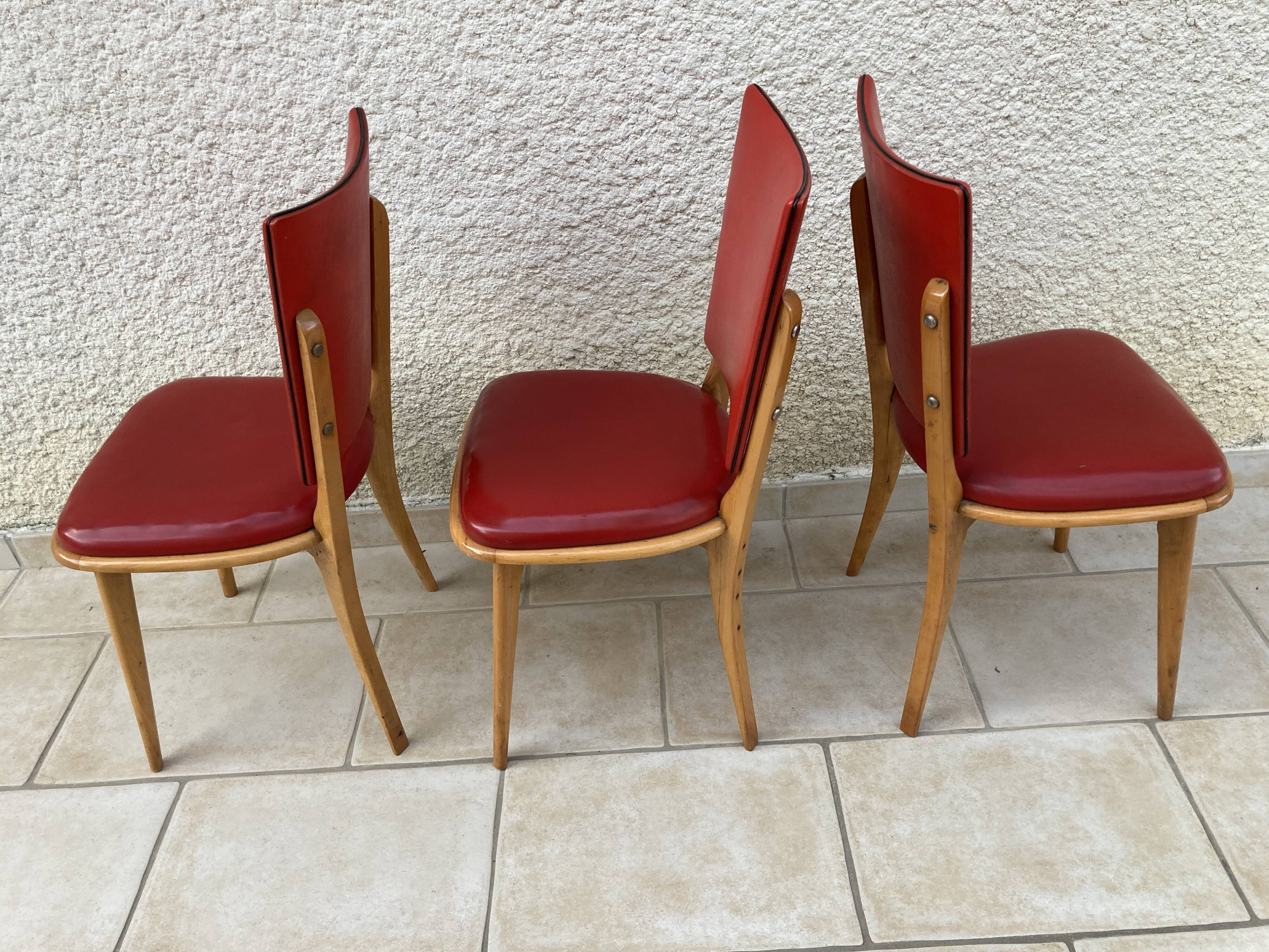 3 chairs in red Skaï