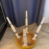 Old stool early 20th century wooden legs and round padded seat