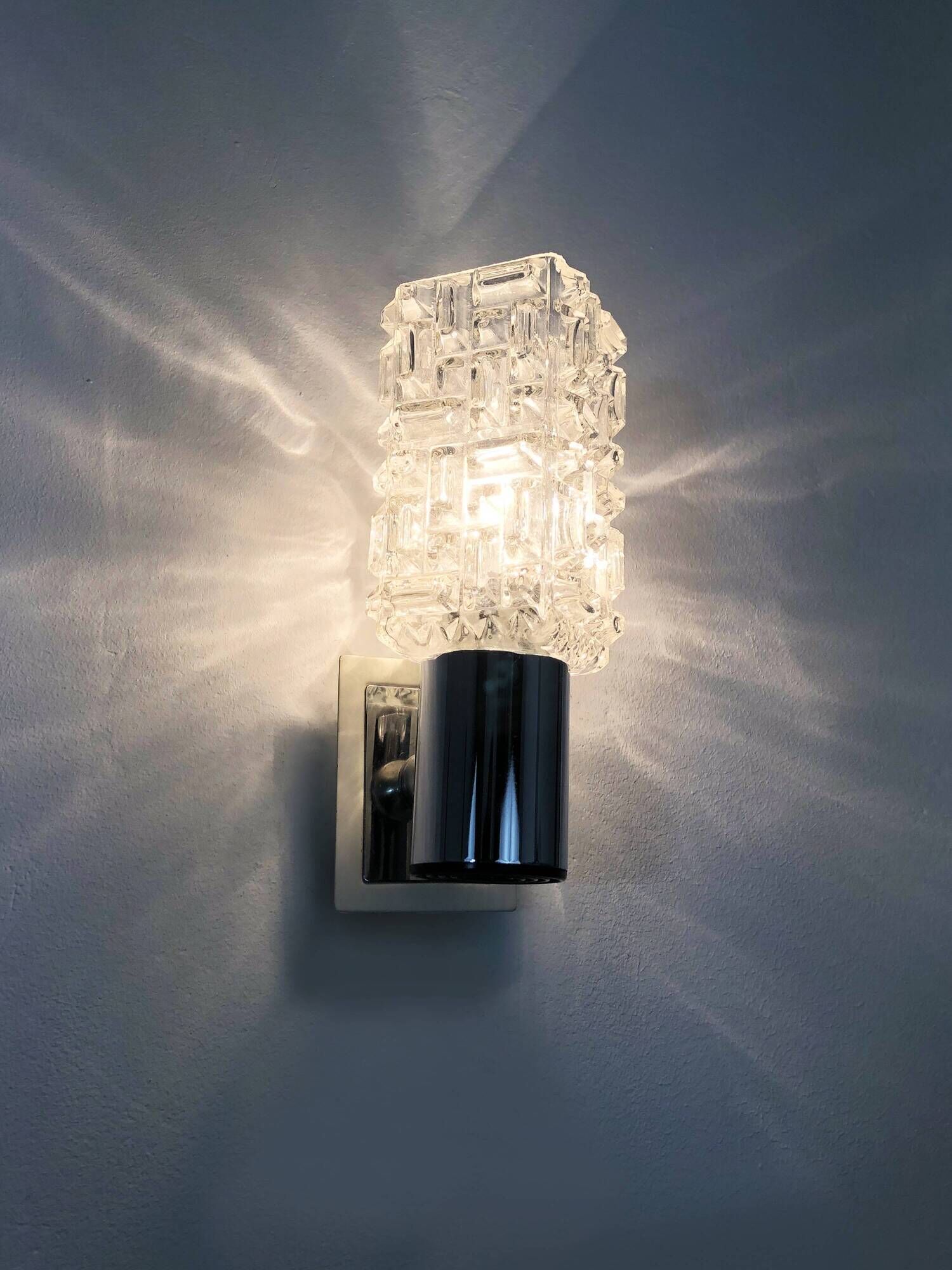 Pair of space age wall sconces, stainless steel and thick glass, 60s 70s