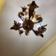 Set of 3 gold painted metal chandeliers
