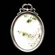 Louis XVI style oval metal wall mirror