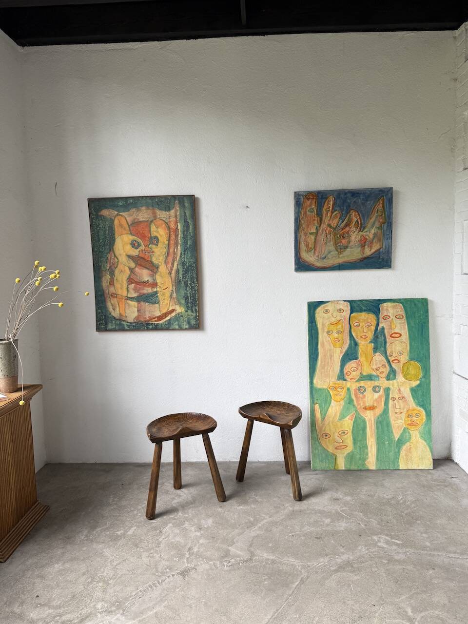 Pair of Le Selou tripod shepherd's stools