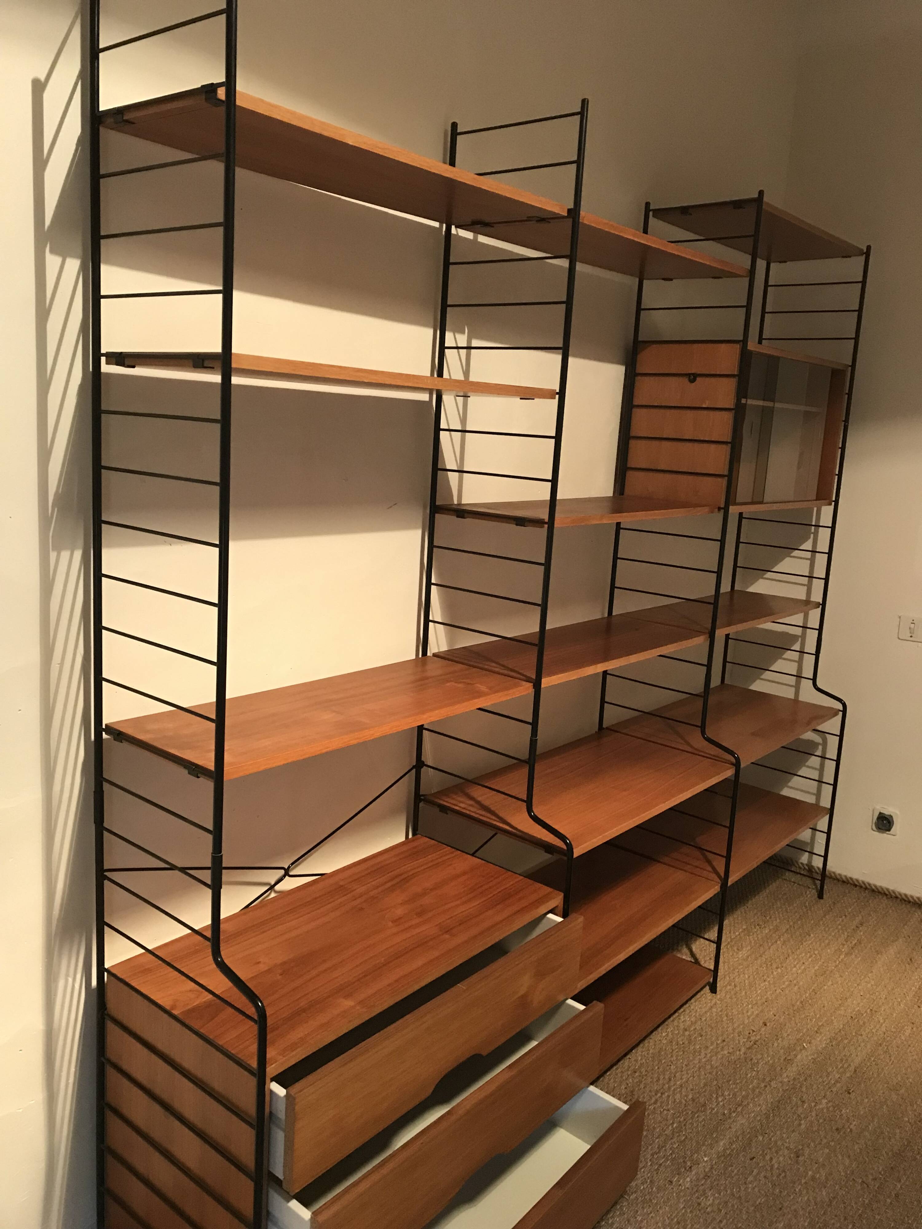 Vintage modular wall-mounted library shelf in blond walnut 1960-80