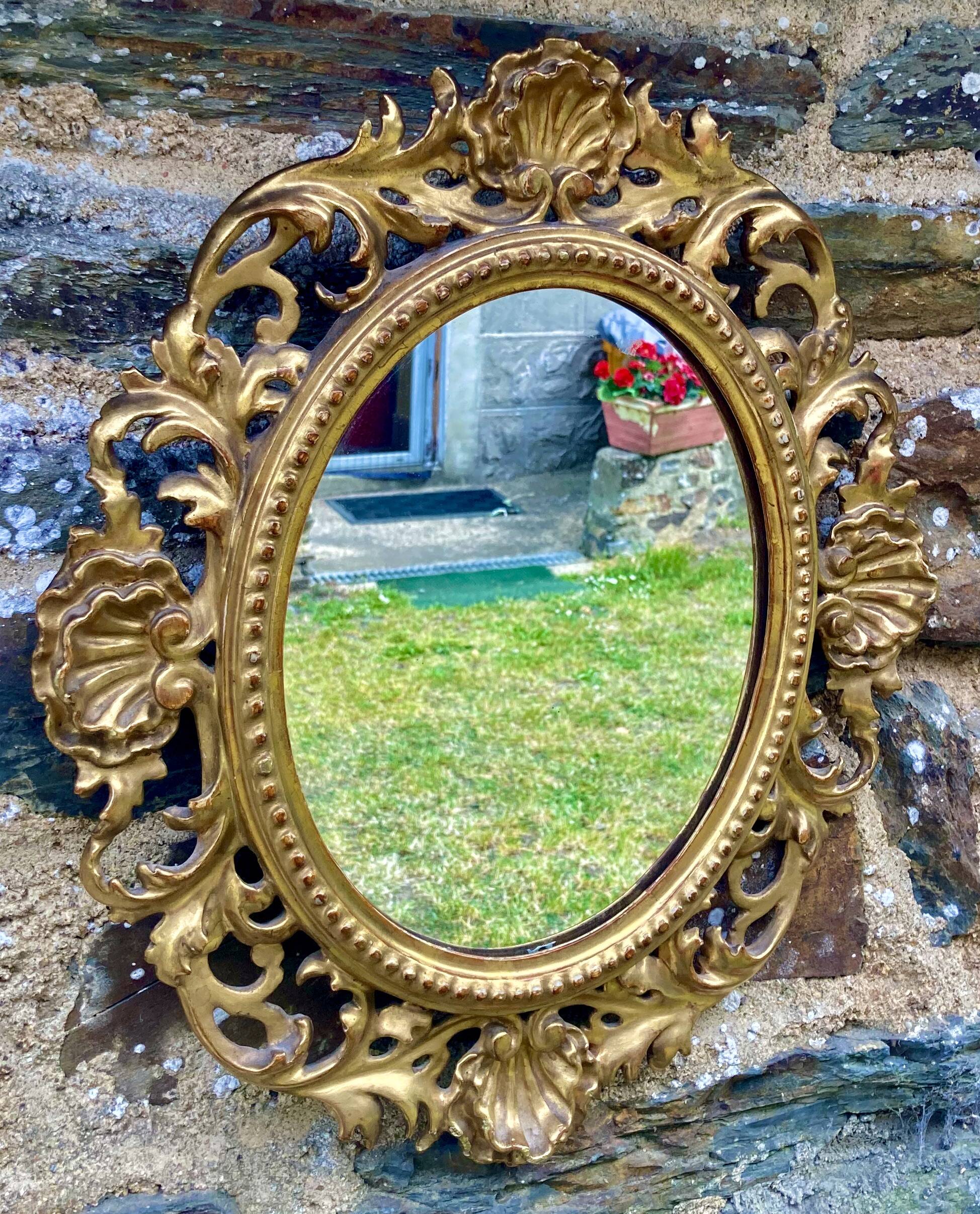 Mirror in carved wood gilded with leaf, Louis XV period, 18th century
