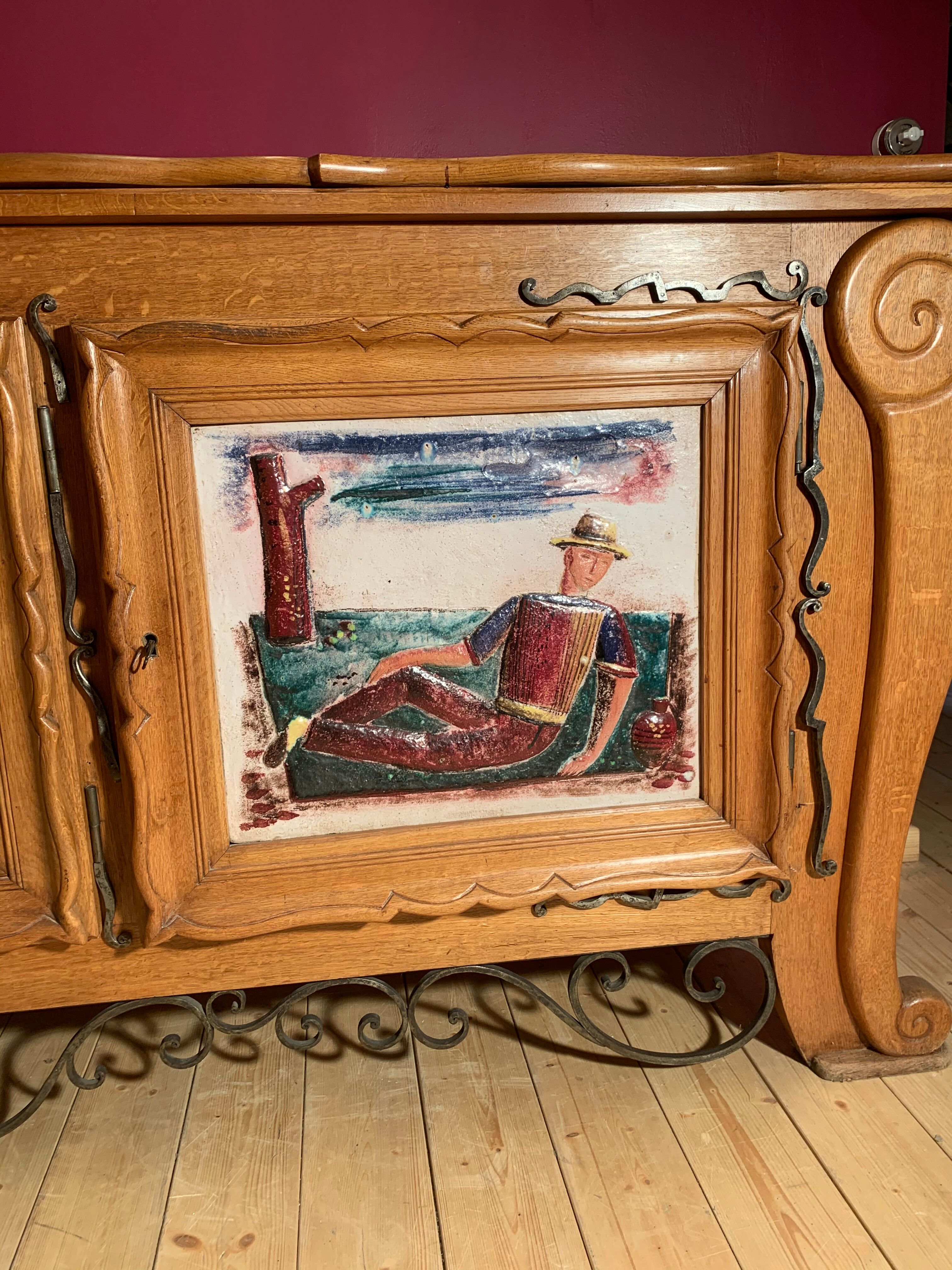 Modernist wood and ceramics sideboard of the 1950s