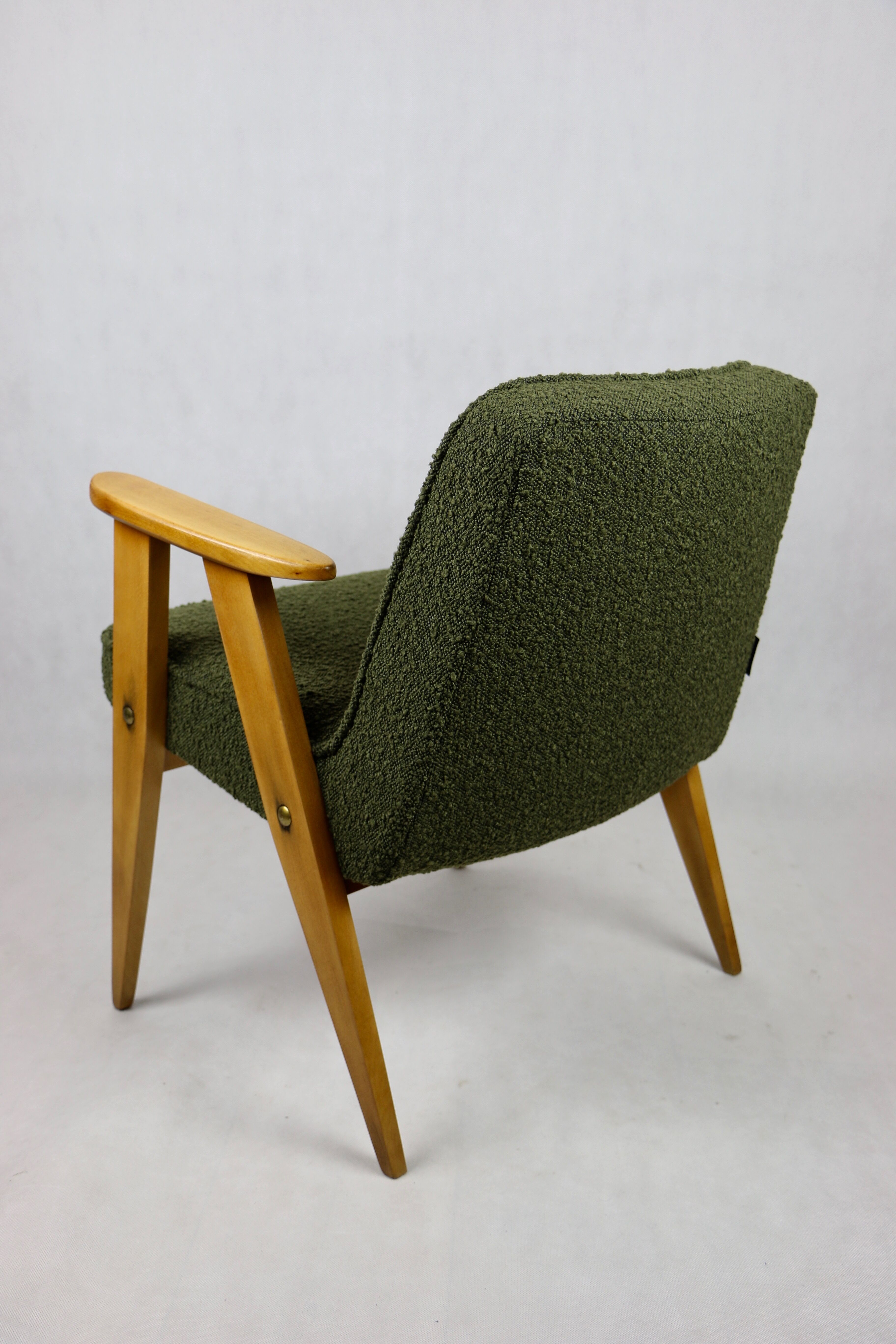 366 olive boucle armchair, 1970s