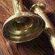 Pair of brass push-button candlesticks