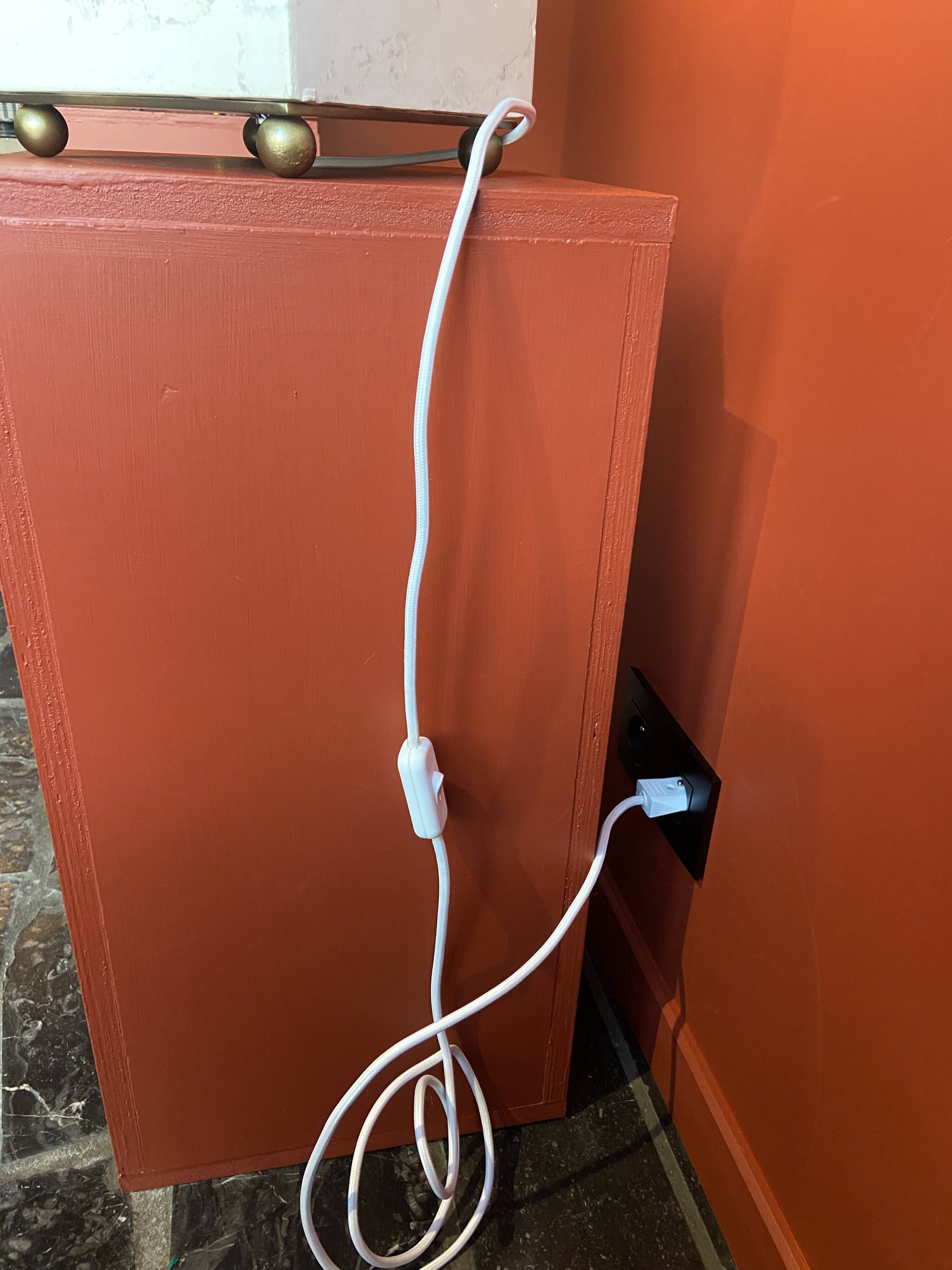 Beige marble stucco base, Houles white ecru fringed lampshade.