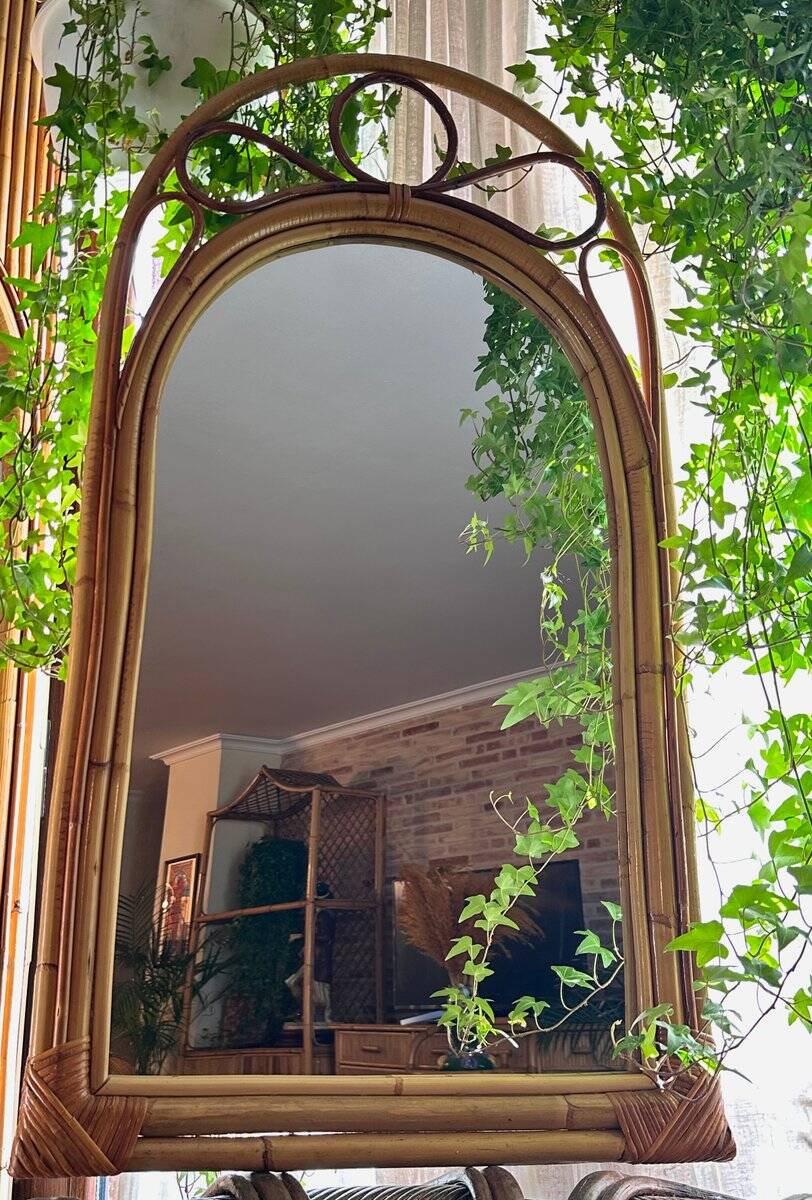 Arched Spanish wall mirror in rattan and bamboo, 1960s.