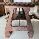 Table basse brutaliste en bois et fer forgé