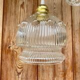 Vintage flower-shaped transparent glass pendant globe.