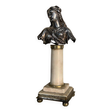 Bust of the Virgin in silver, column in marble.