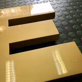 Golden sign letter E