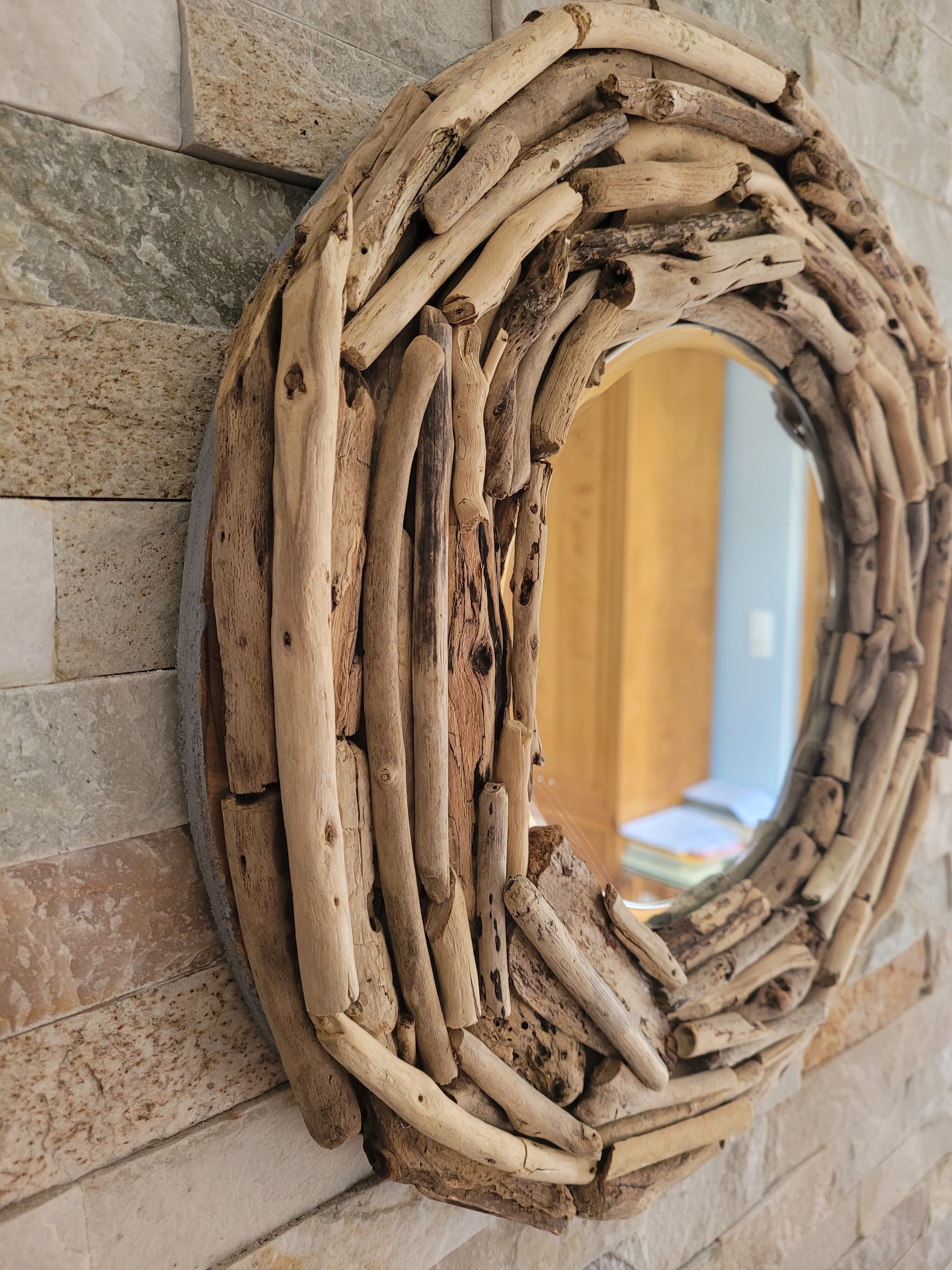 Very nice driftwood mirror.